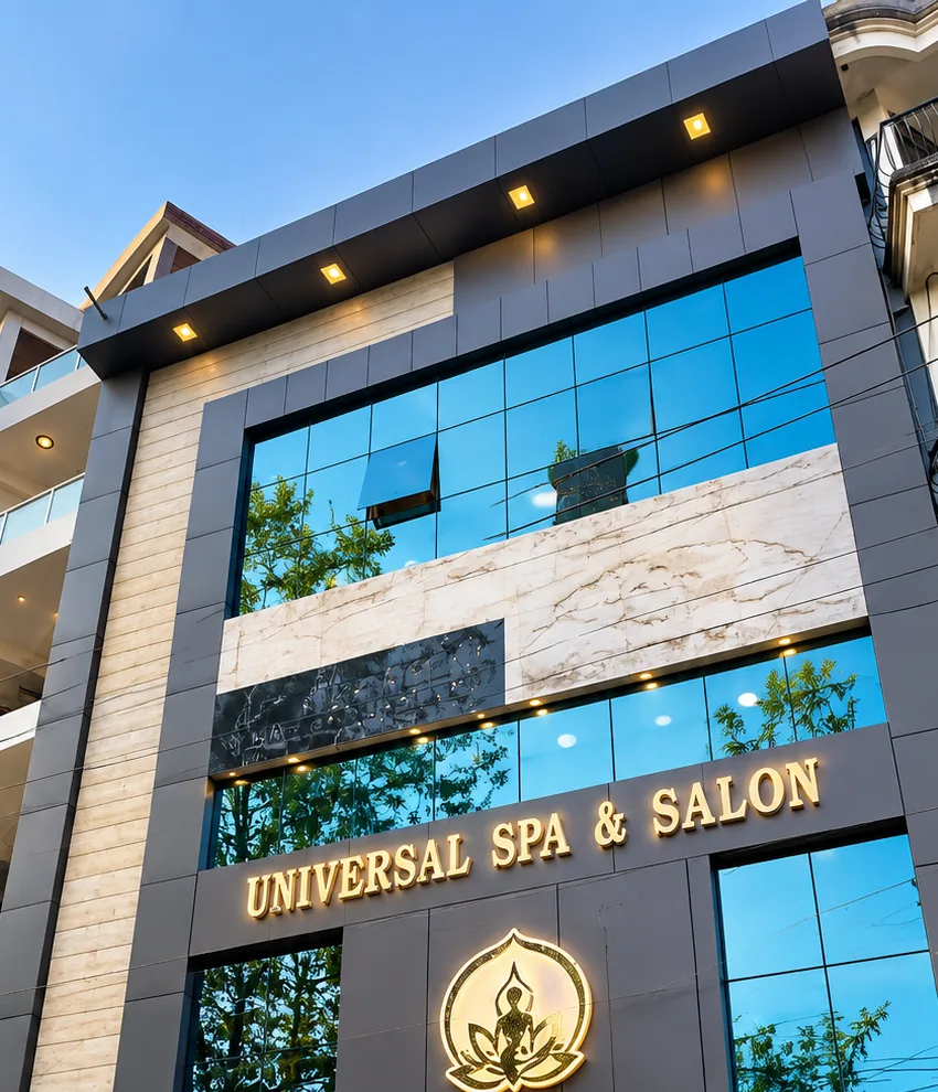 Universal Spa & Salon building in Ara with the gold sign and lotus emblem